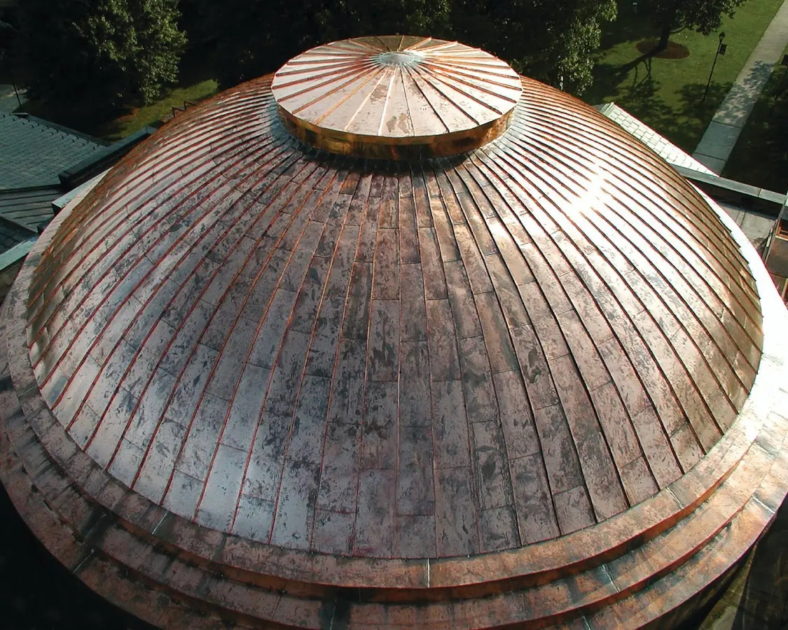 Craftsman Roofing crew installing a new roof in Primos